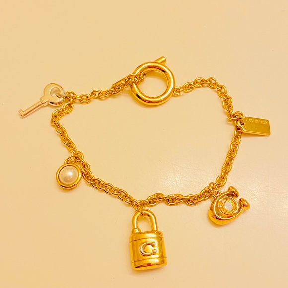 Coach Jewelry Coach Charm Bracelet Poshmark